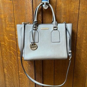 Tan Michael Kors leather tote bag with gold accents